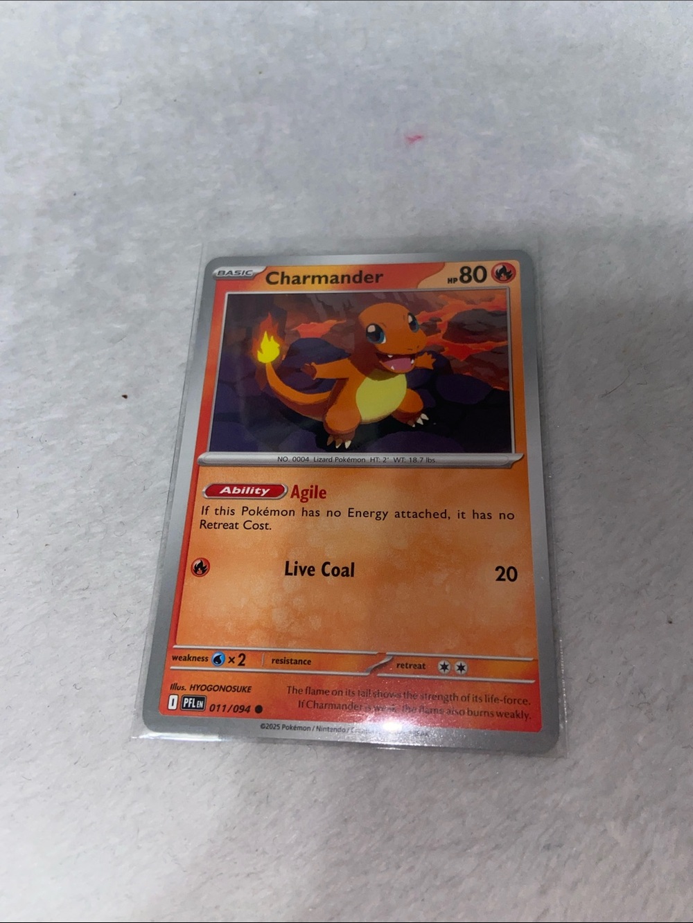 Charmander #011/094 ME02: Phantasmal Flames (PFL)